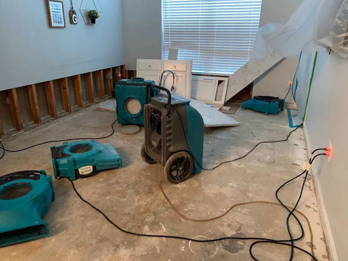 Dehumidifier in flood-cut room for Water Damage Restoration in Monticello